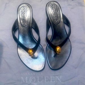 Alexander McQueen black velvet , gold crystal skull , thong flip flop .